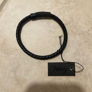Men’s black woven bracelet. Never worn and comes with box. Size 8.5 (large).